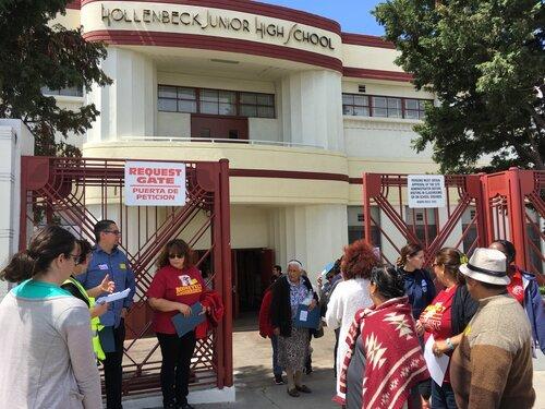 Parents and community members getting ready to start the walking and biking assessments at Hollenbeck Junior High School in Boyle Heights.