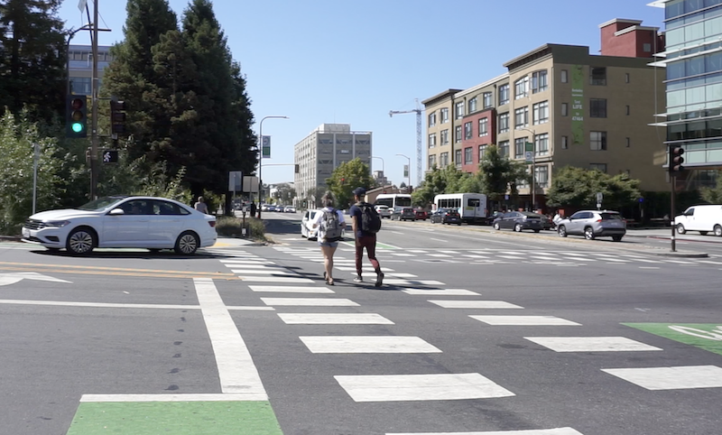 Pedestrians in crosswalk on Hearst Avenue, Berkeley, CA
