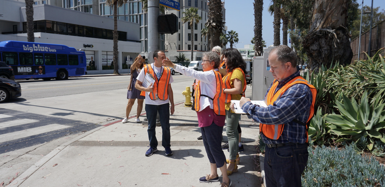 Community members conducting a walk audit on Wilshire Blvd.