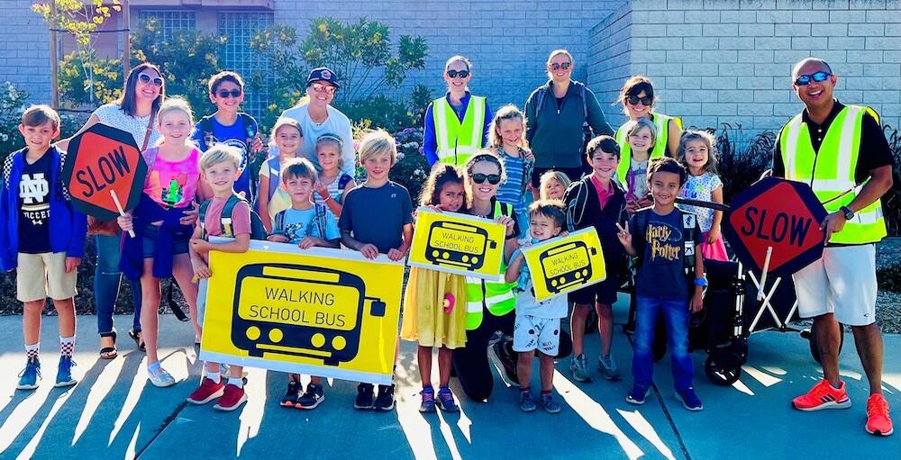 Mayor Jed Leano with a group photo of the parents and students that participated in the Condit Elementary School Walking School Bus 