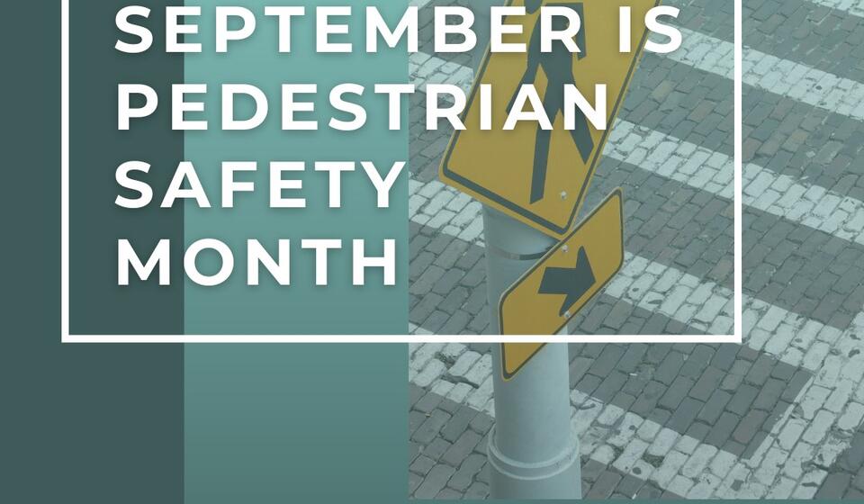 A photo of a crosswalk is overlaid with the text "September is Pedestrian Safety Month"
