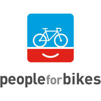 Logo for PeopleForBikes showing a white bicycle on a blue background with a smile in white on a red background below it